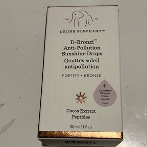 Drunk Elephant D-Bronzi Anti-Pollution Sunshine Drops - White and Bronze